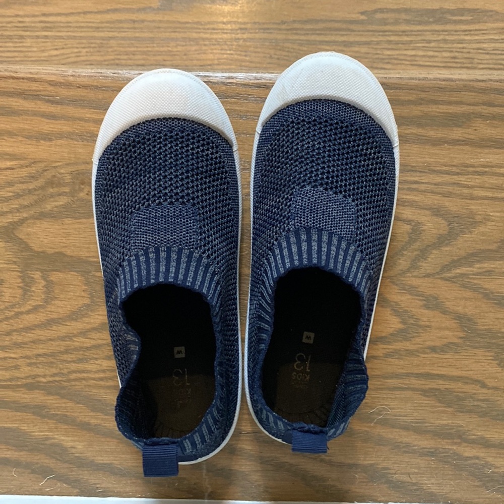 Boys slip on playground shoes
